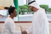 Loretta shaking hands with the Crown Prince of Abu Dhabi