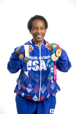Loretta with medals